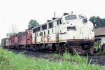 Kansas City Southern power (#95, #85, #4106) with caboose #327 at Hope. 